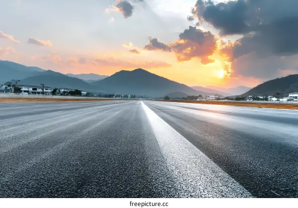 Asphalt Road at Sunset Mountain View