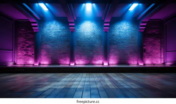 Blue and purple lights on stage with brick background