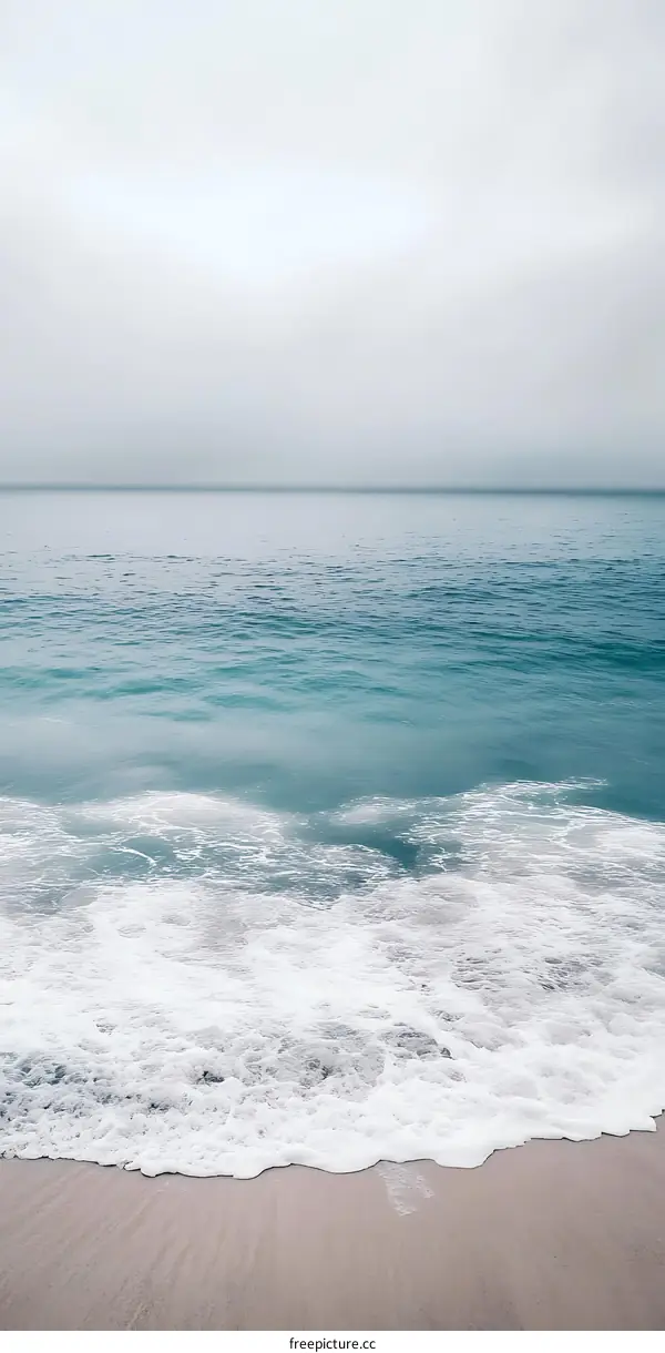 Minimalist Beach Scene With Foamy Waves