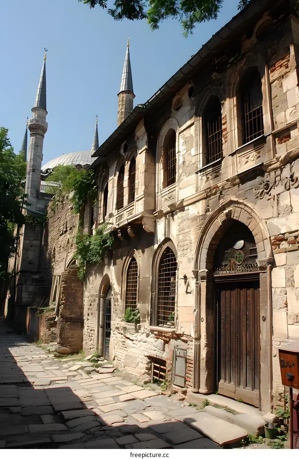 Narrow Street with Old Buildings and Mosque