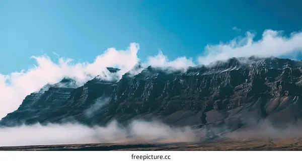 Mountain Landscape with Clouds and Fog