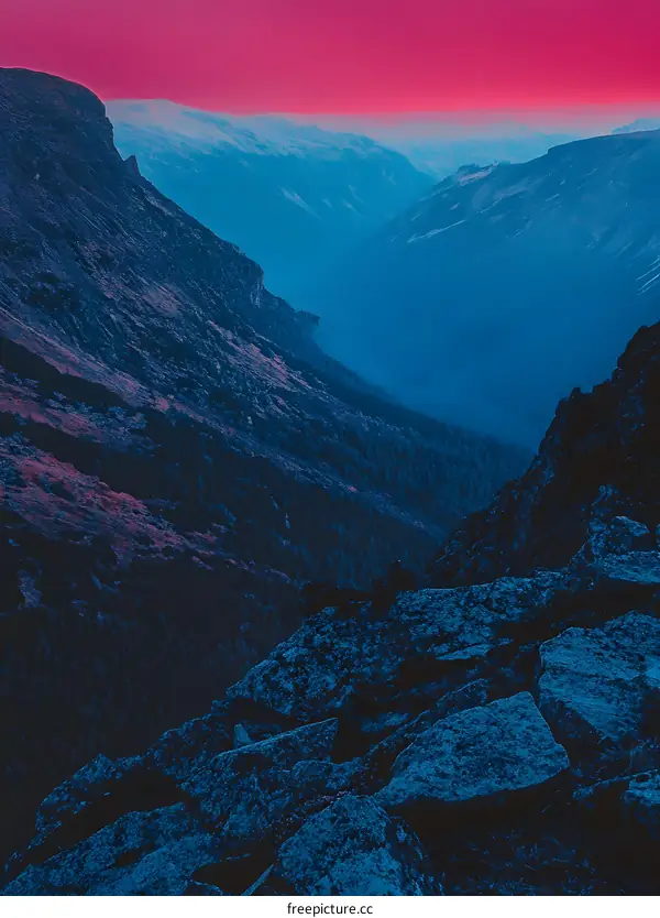 Blue and Pink Sunset Over Mountain Range