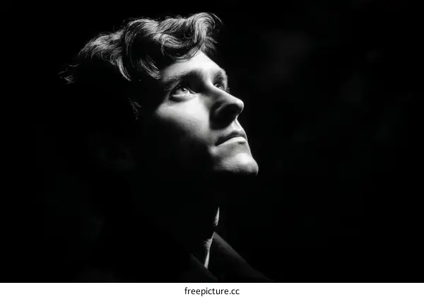 Man Looking Upward in Silhouette