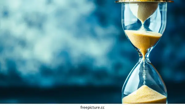Golden Hourglass on Blue Background