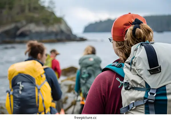 Group of Hikers Looking Out Over the Ocean