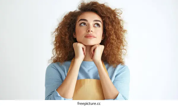 Thoughtful Woman with Curly Hair Portrait