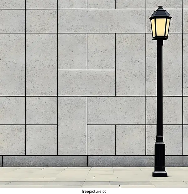 Simple Black Street Light Next To Stone Wall