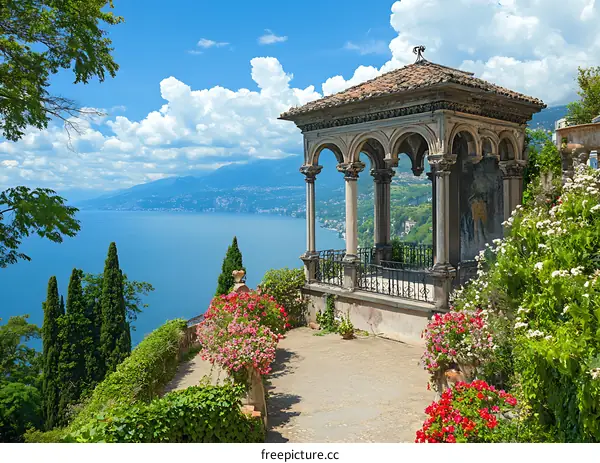 Stone Gazebo Overlooking the Lake with Lush Greenery