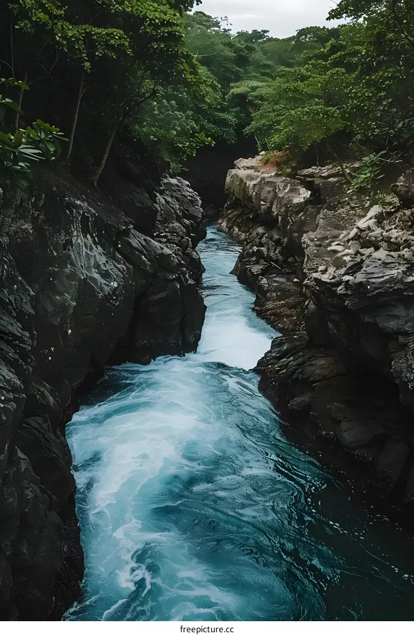 Blue Water Flowing Through Rocky Gorge
