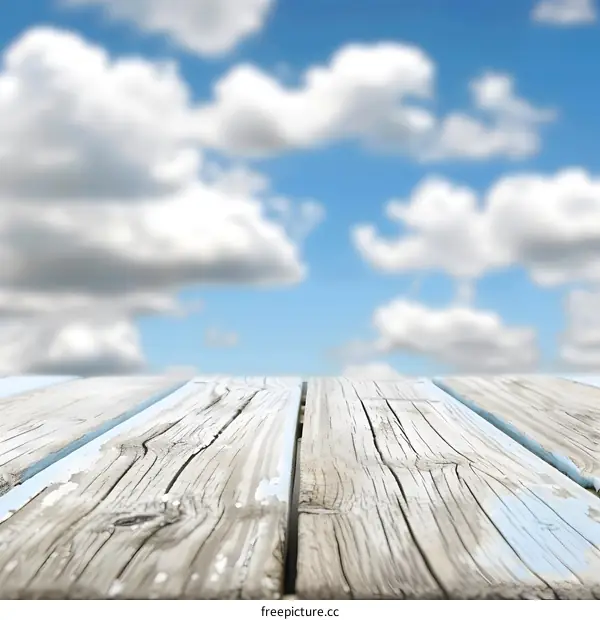 Wooden Plank Against Blue Cloudy Sky