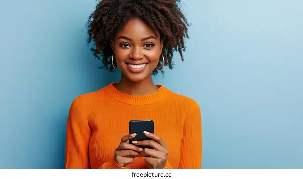 Smiling Woman Holding Smartphone Portrait