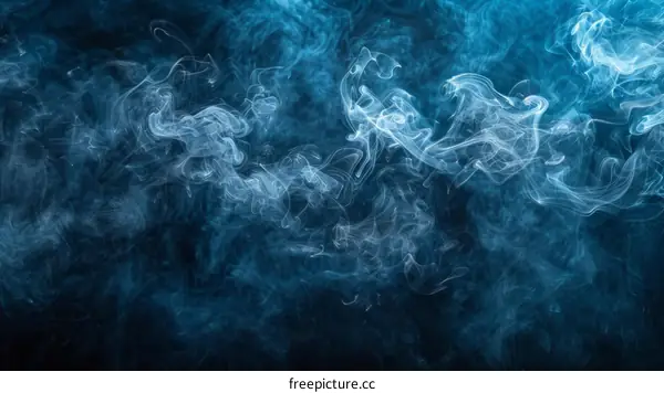 Blue smoke swirls on a dark background