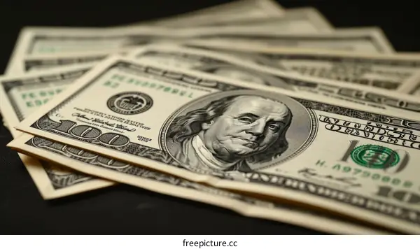 A stack of one hundred dollar bills