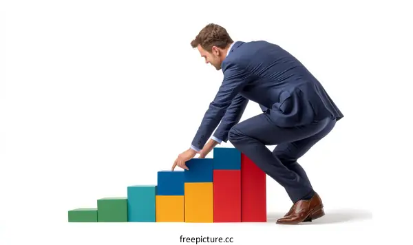Businessman Building Colorful Stairway to Success