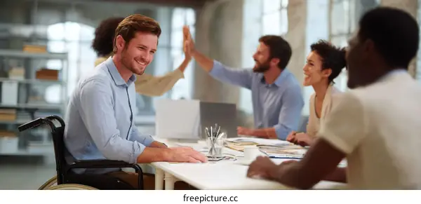 Diverse Team Celebrating Success in Modern Office