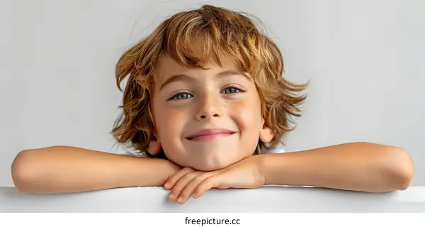 Portrait of a happy smiling redheaded boy