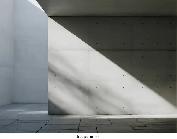 Concrete Wall Architecture with Geometric Shadow Patterns