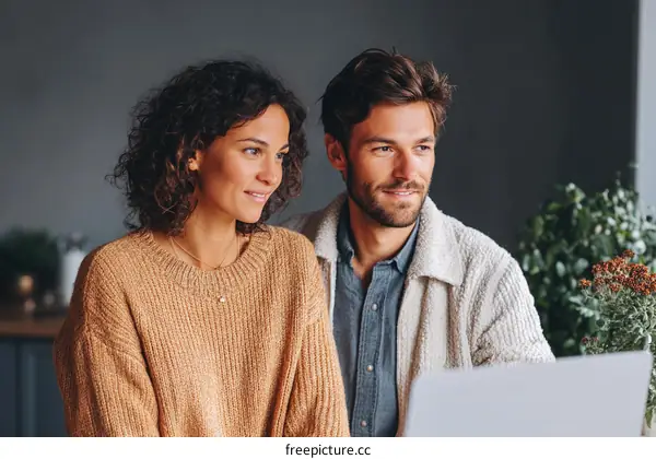 Couple Working Together on a Laptop