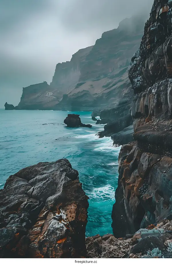 Ocean Waves Crashing Against Rugged Cliffs
