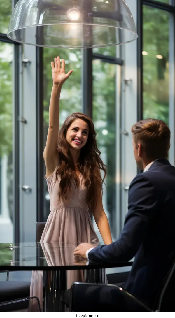 woman raising hand to get attention of waiter or waitress in restaurant