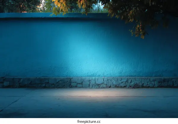 Night Scene of a Vibrant Blue Wall