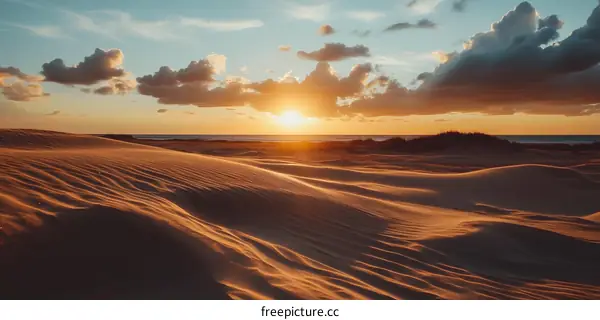 Golden Sunset Over Sand Dunes
