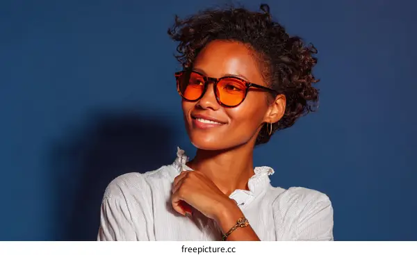 Smiling African Woman Wearing Stylish Sunglasses