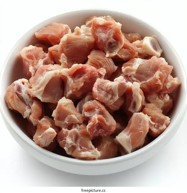 Raw Cubed Pork Ribs in a White Bowl