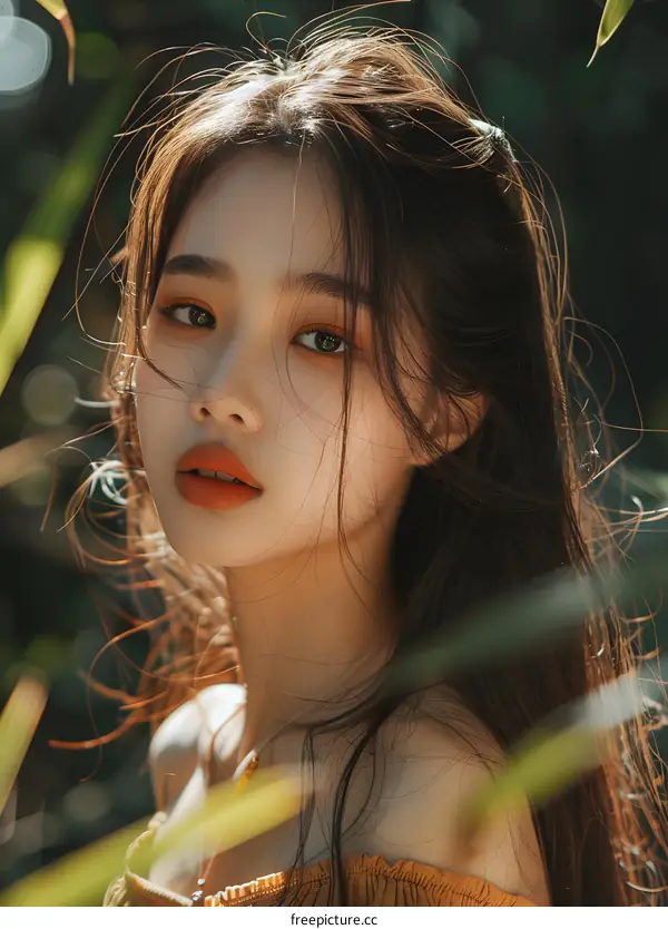 Young Asian Woman with Long Hair in a Forest