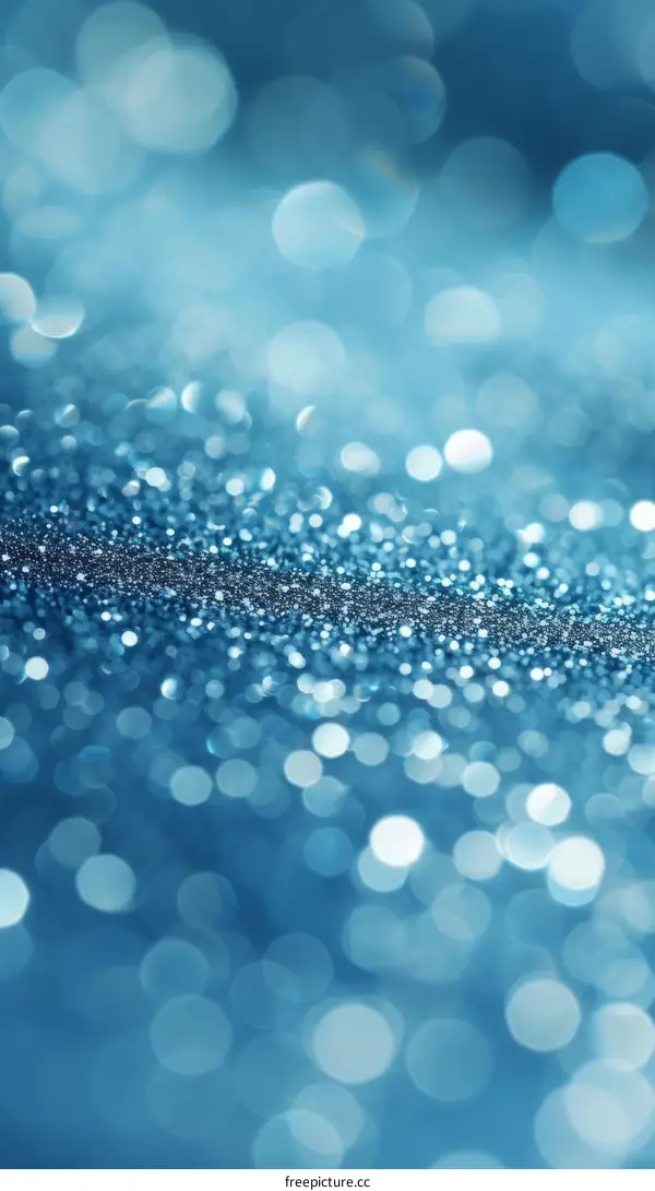 Blue glitter sparkles with a blurred background