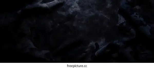 Dark Camouflage Fabric Texture Background