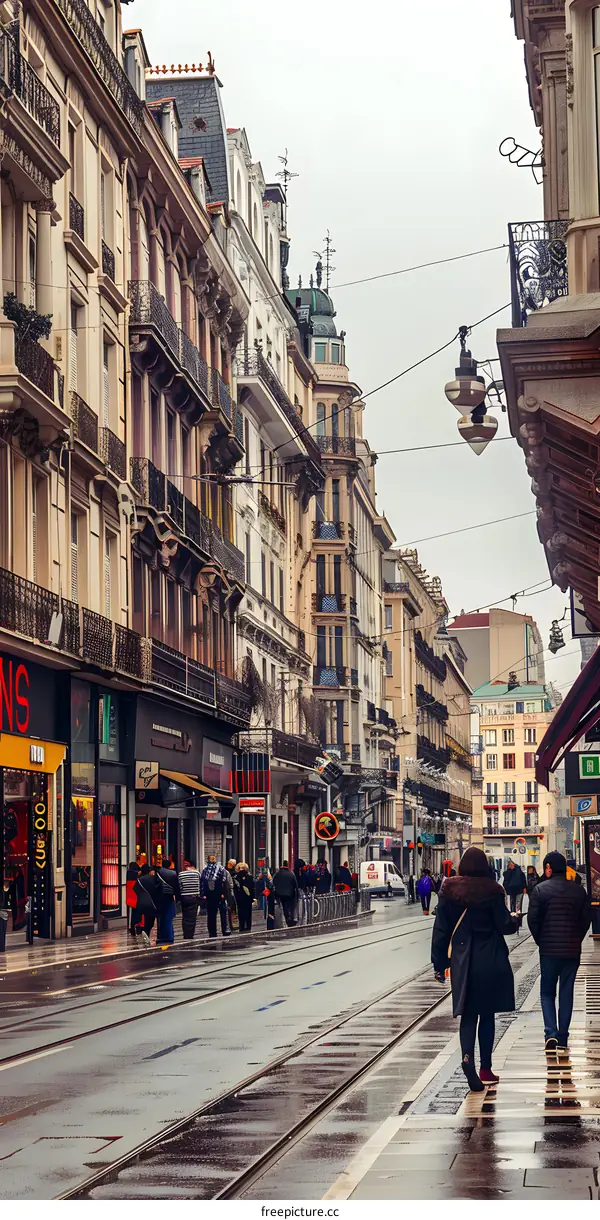 European City Street with Tram Tracks and People Walking