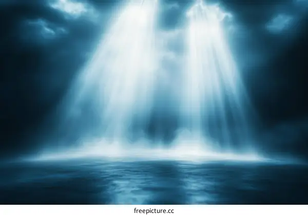 Dramatic Light Beam through Dark Clouds over Water