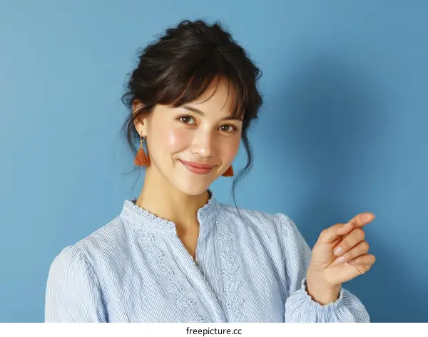 Asian Woman Presenting on a Blue Background