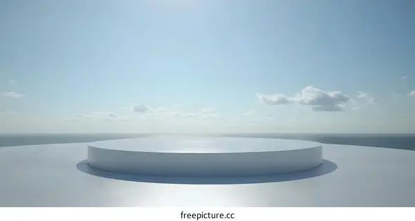 Minimalist White Platform Against Blue Sky and Ocean Background