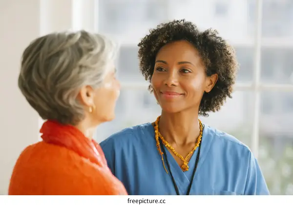 Two Adults in Conversation Medical Setting