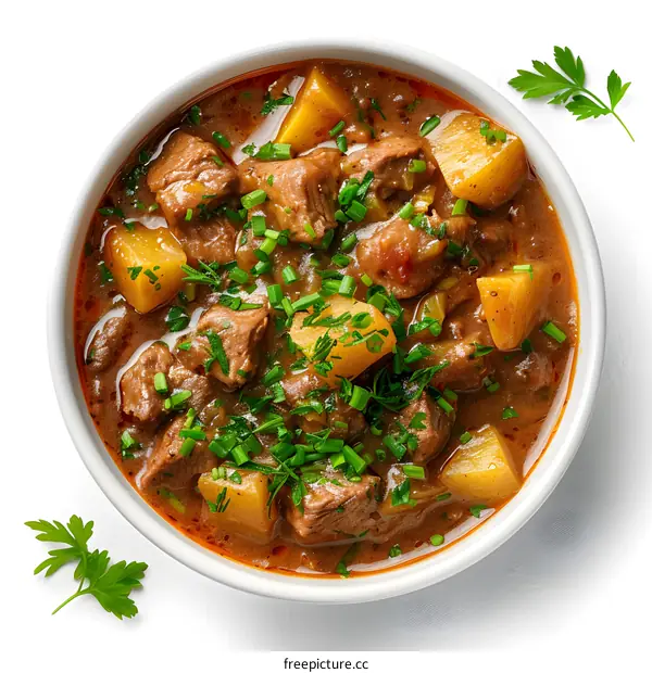 Beef stew with potatoes in a white bowl