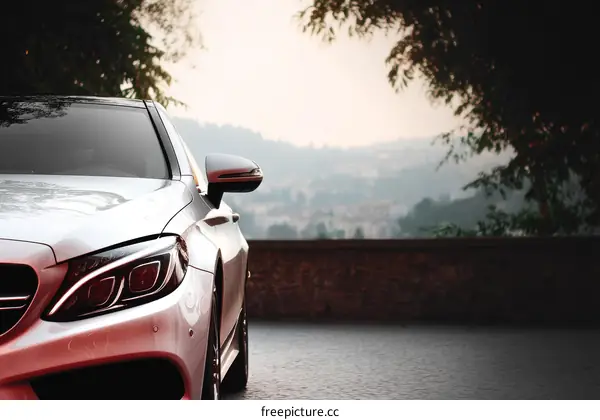 Elegant Silver Car on a Scenic Lookout