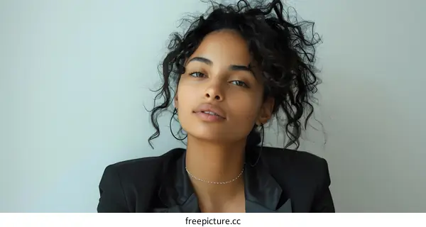 portrait of a young woman with curly hair