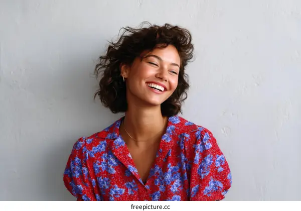 Smiling Woman in a Floral Print Dress