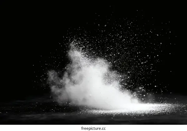 Abstract White Powder Explosion on Black Background