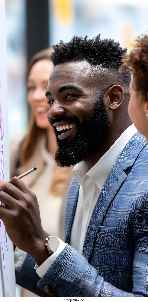 Smiling Black Man Writing on Whiteboard During Meeting