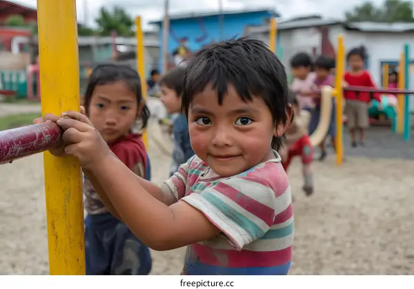 Little Girl Smiling at Camera on Playground