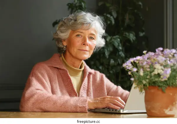Senior Woman Using Laptop at Home