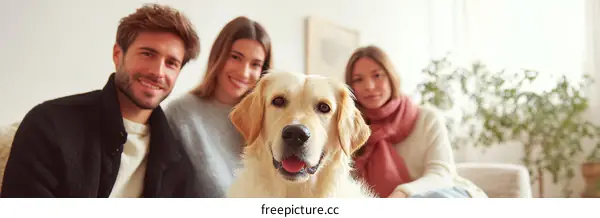 Happy Family with a Golden Retriever