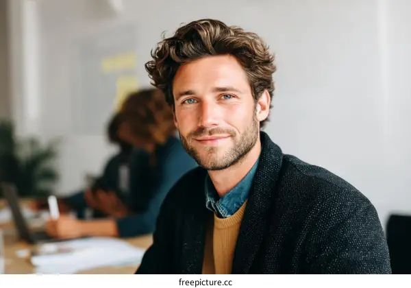 Business man portrait in modern office setting