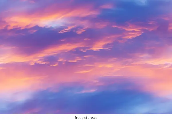 gradient sunset sky with pink orange and blue colors