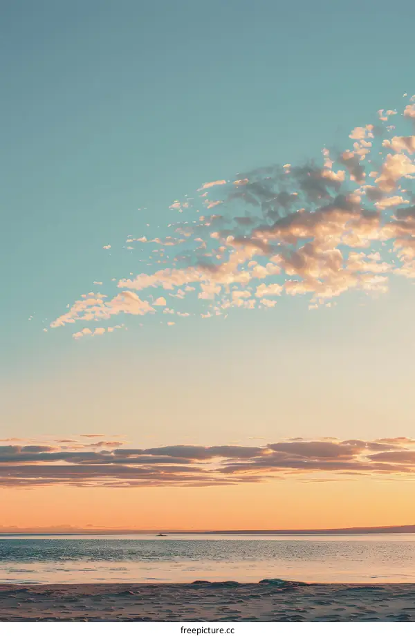 Beautiful Sunset Sky Over The Ocean With Fluffy Clouds