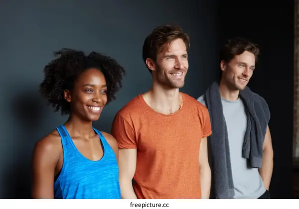 Three Diverse People Posing in a Studio