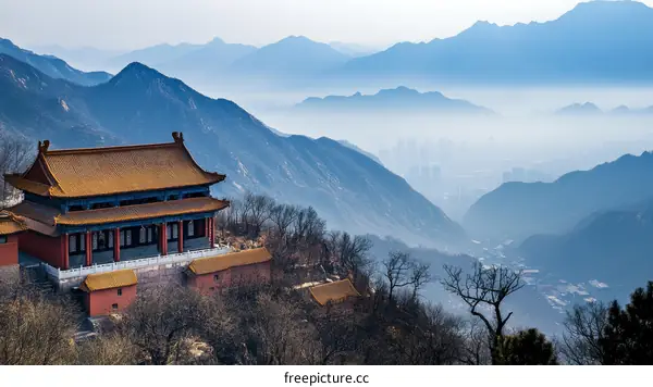 Majestic Chinese Temple amidst Misty Mountains